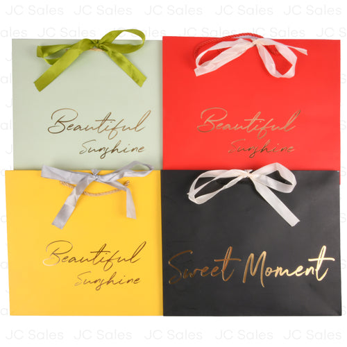 gift bag solid medium asst clrs -- 12 per box